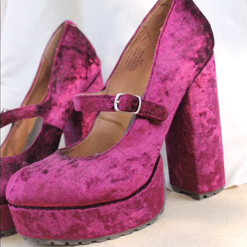 Velvet magenta high heels.